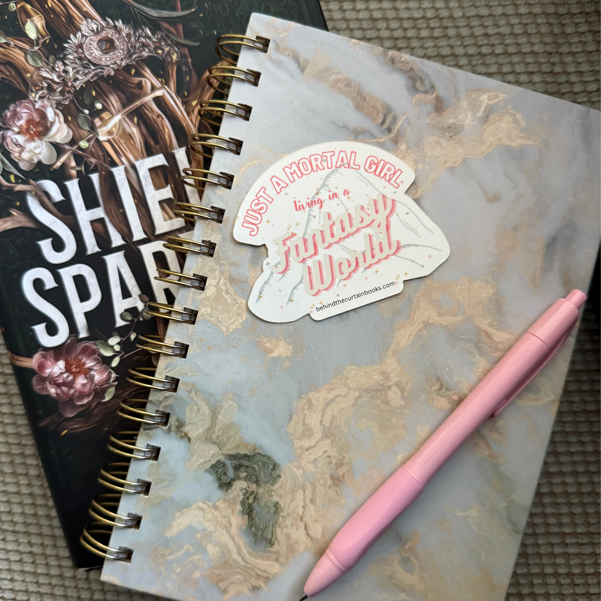 Lifestyle image with just a mortal girl living in a fantasy world sticker on a journal